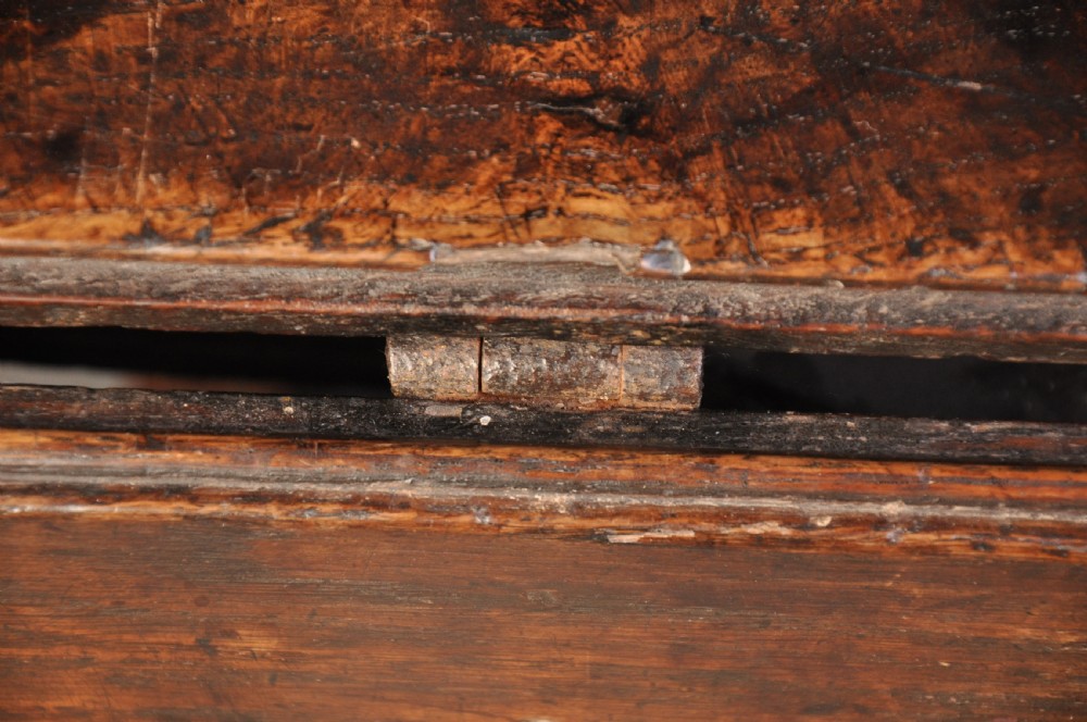 A seventeenth-century oak gateleg table shown with drop leaves folded down, featuring turned legs and low box stretchers. View IX