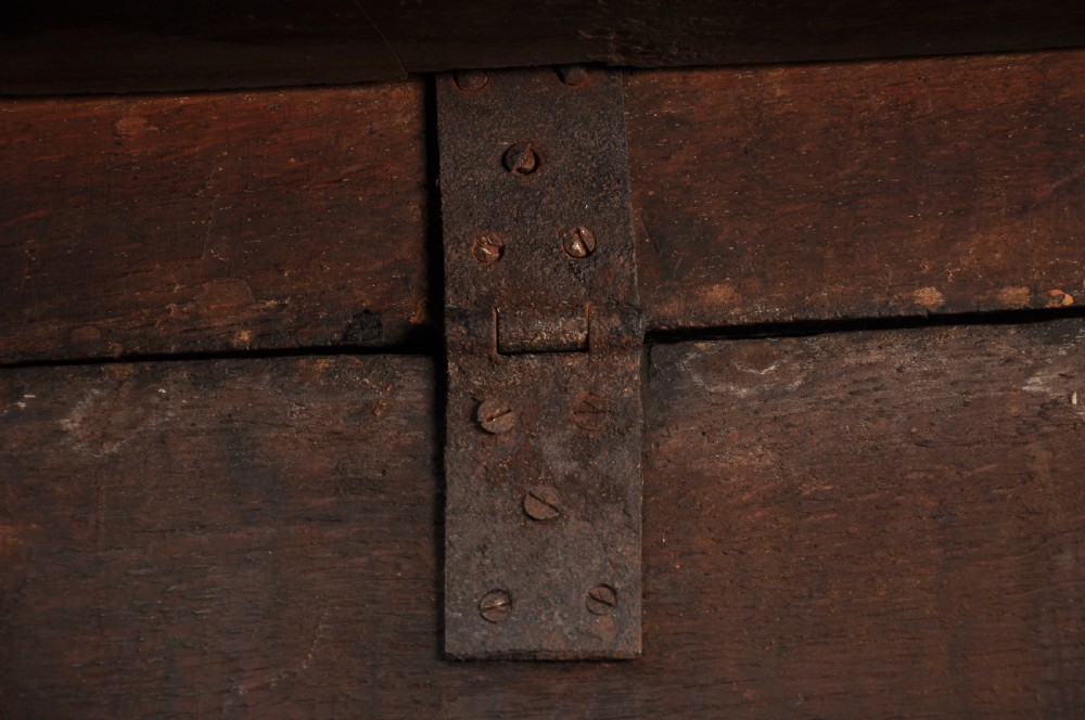 A large 17th-century solid oak gateleg dining table with two drop leaves, turned legs, and square box stretchers. View VII