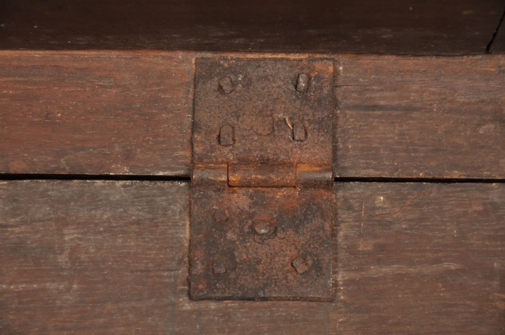 A seventeenth-century oak gateleg dining table featuring hinged drop leaves and turned wood legs with low stretchers. View VII