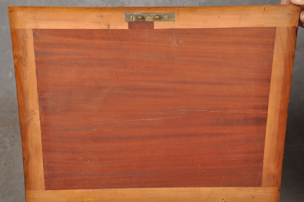 A rectangular 17th-century olive wood lace box featuring geometric oyster veneer marquetry on the lid and a brass keyhole escutcheon on the front. View VII