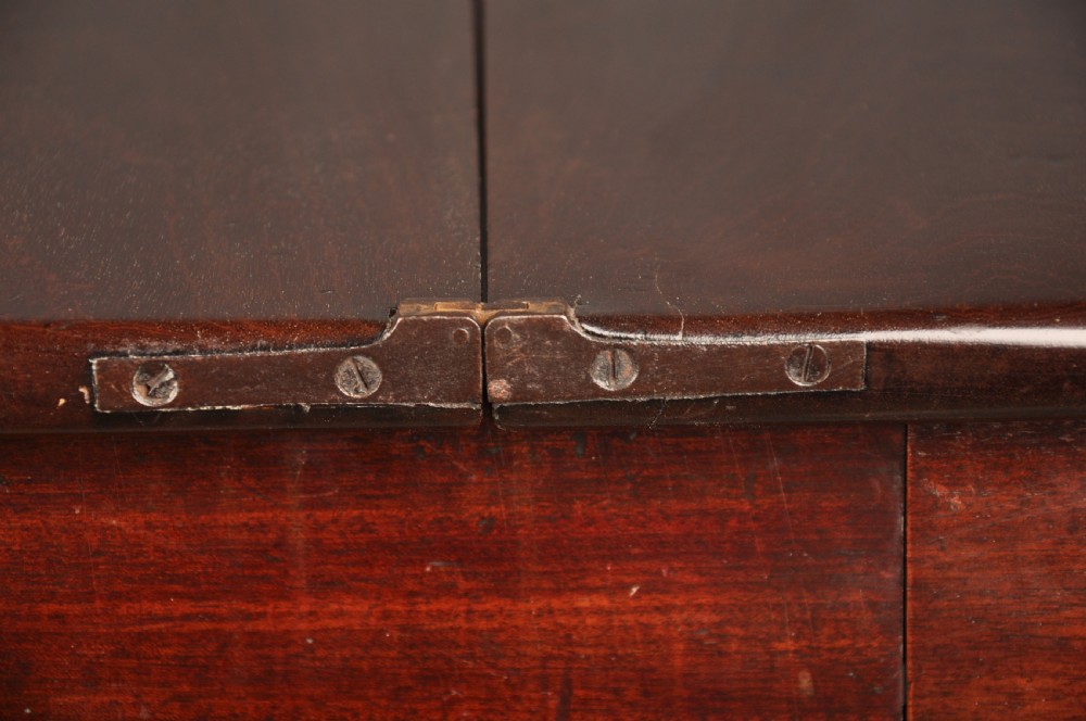 An 18th-century mahogany tea table featuring a folding rectangular top, concertina frame action, and cabriole legs with pad feet. View VIII