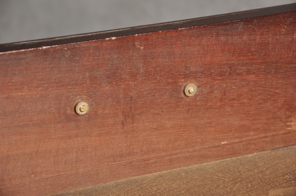 An eighteenth-century mahogany slant-front writing bureau featuring four graduated drawers with brass swan-neck handles and bracket feet. View XVI