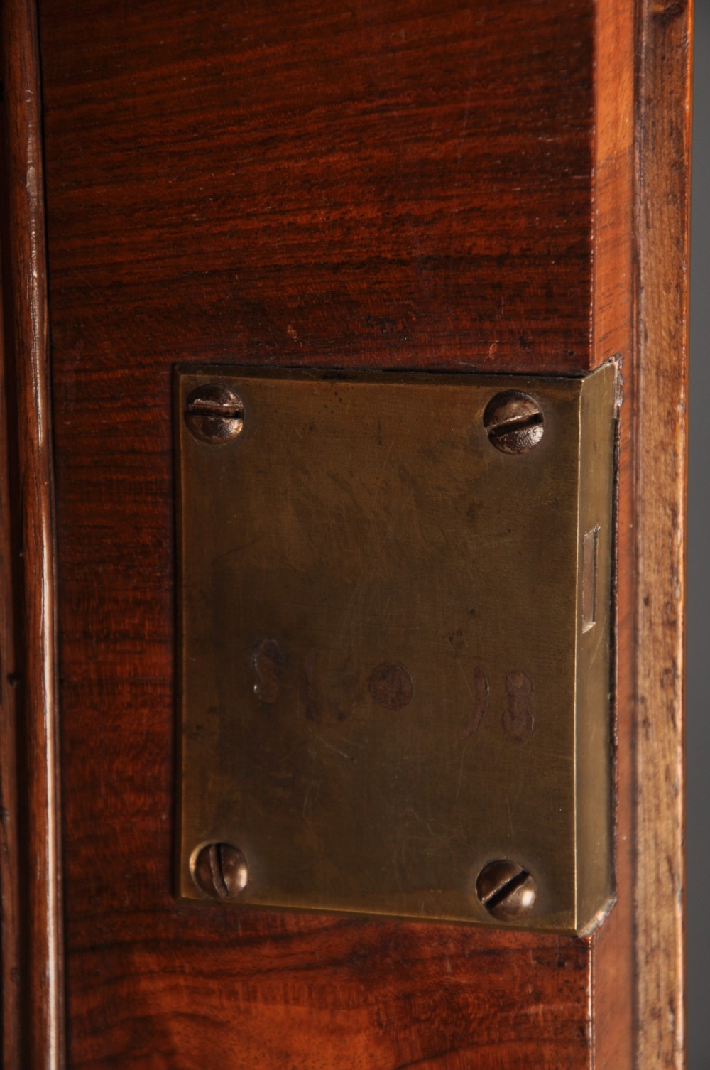 An early eighteenth-century burr walnut secretaire cabinet featuring double upper doors and a lower chest of drawers with brass handles. View VII