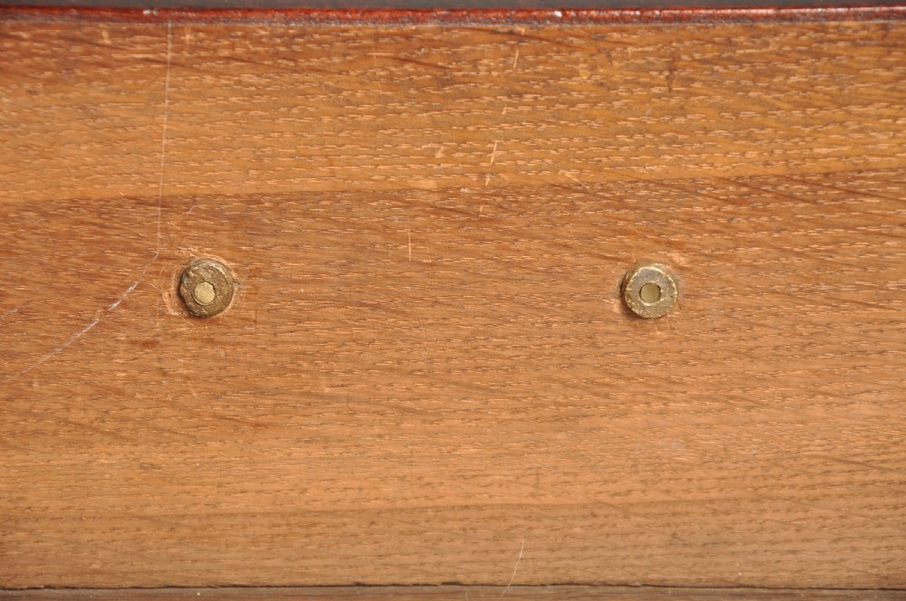 An 18th-century Georgian mahogany chest featuring four graduated drawers with brass swan-neck handles and bracket feet. View VIII