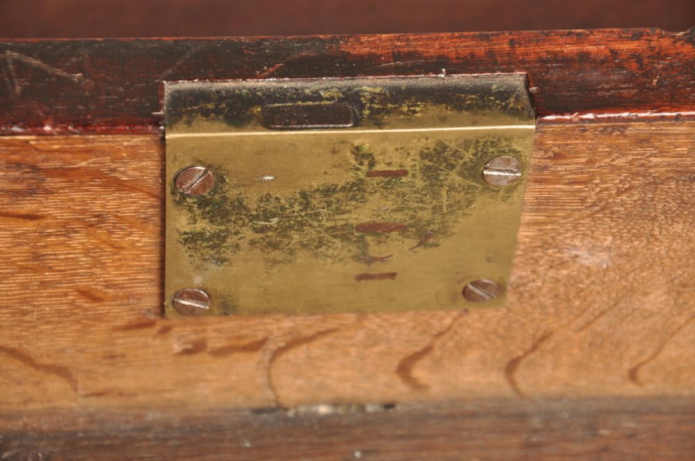 An 18th-century Georgian mahogany chest featuring four graduated drawers with brass swan-neck handles and bracket feet. View IX