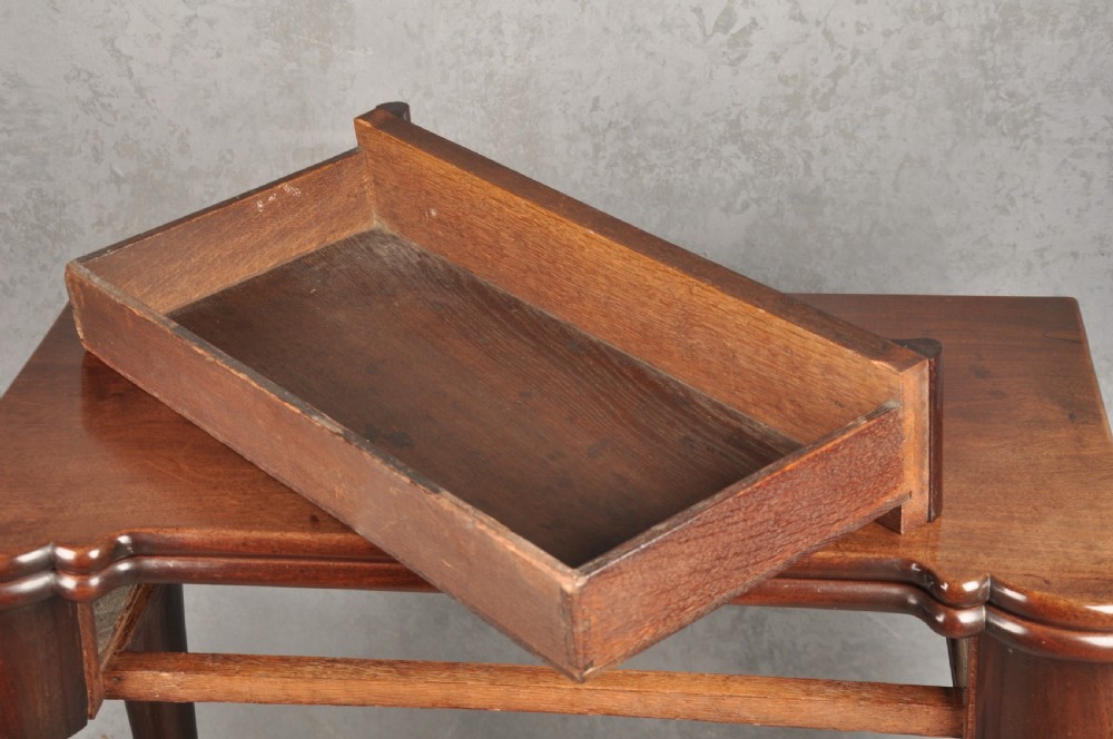 An 18th-century Georgian mahogany fold-over tea table featuring cabriole legs terminating in hand-carved ball and claw feet. View IV