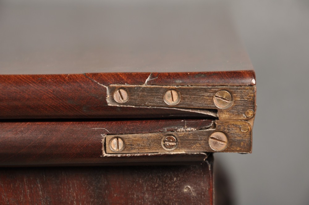 An 18th-century Georgian mahogany fold-over tea table featuring cabriole legs terminating in hand-carved ball and claw feet. View XII