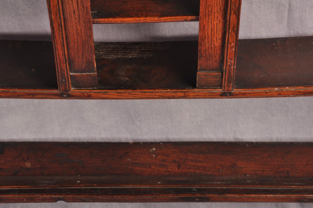 An eighteenth-century dark oak delft rack featuring open shelves, a central arched niche, and a moulded top cornice. View VII