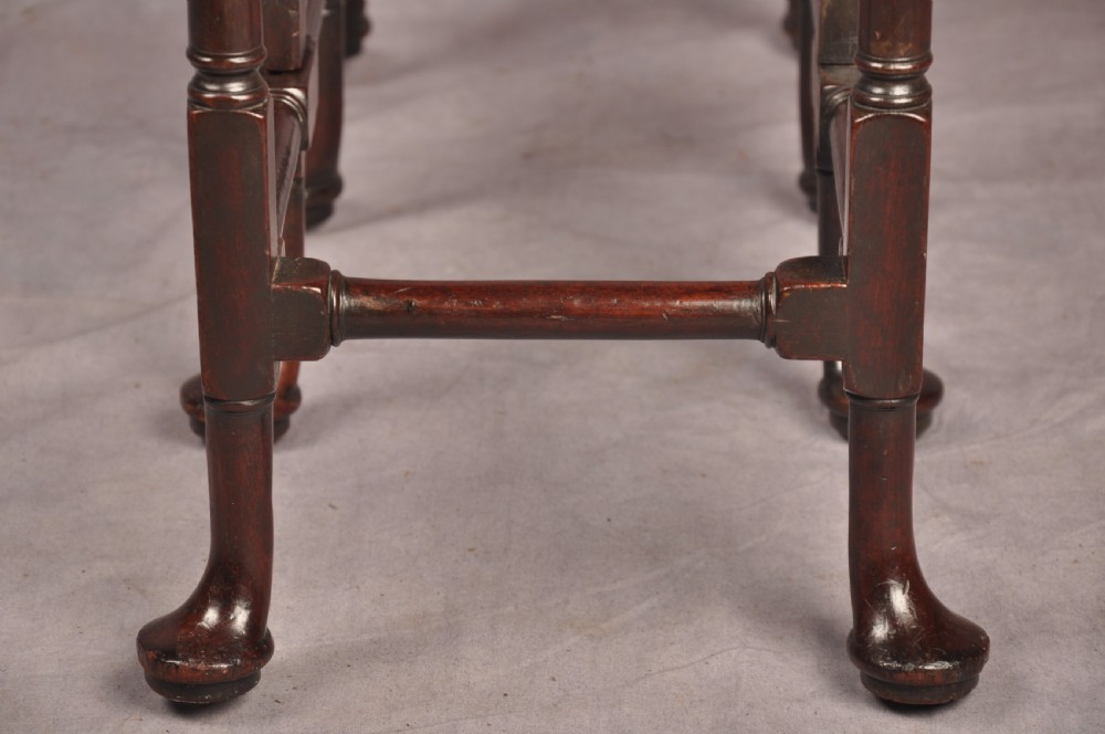 An eighteenth-century mahogany drop-leaf spider table featuring slender turned legs, cross stretchers, and pad feet. View VIII