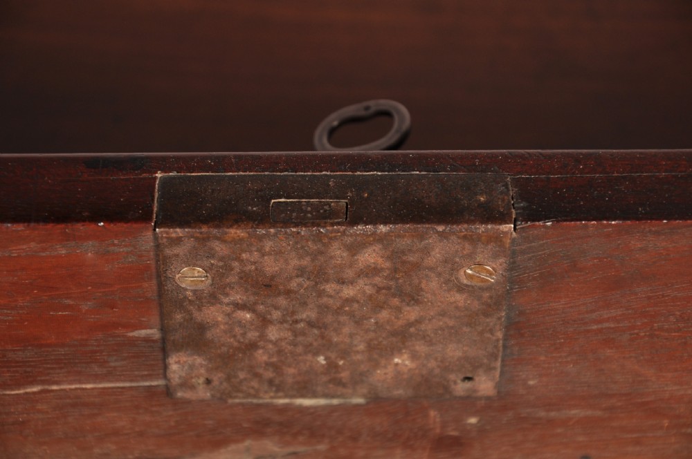 An 18th-century mahogany kneehole desk featuring multiple drawers with brass swan-neck handles, a central recessed cupboard, and bracket feet. View VIII