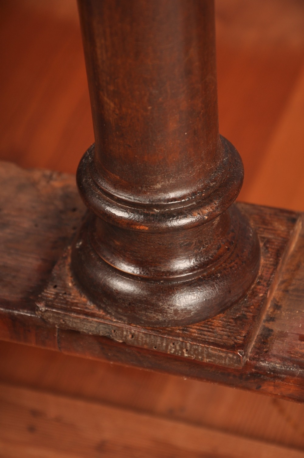 A 17th-century olive wood cabinet on stand featuring double doors inlaid with oval oyster veneer medallions, a lower drawer, turned legs, stretchers, and ball feet. View XXVII