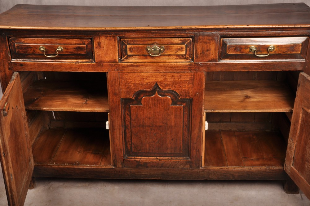 A rare mid 18th Century Welsh Elm Dresser Base View VII