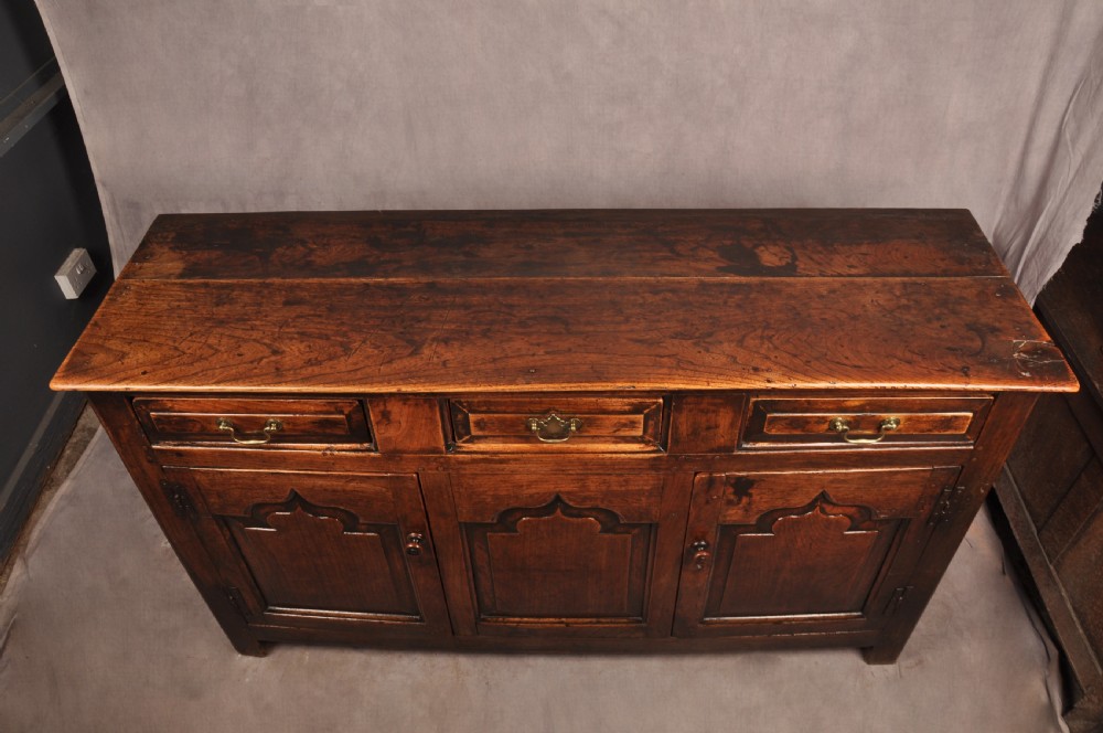A rare mid 18th Century Welsh Elm Dresser Base View X