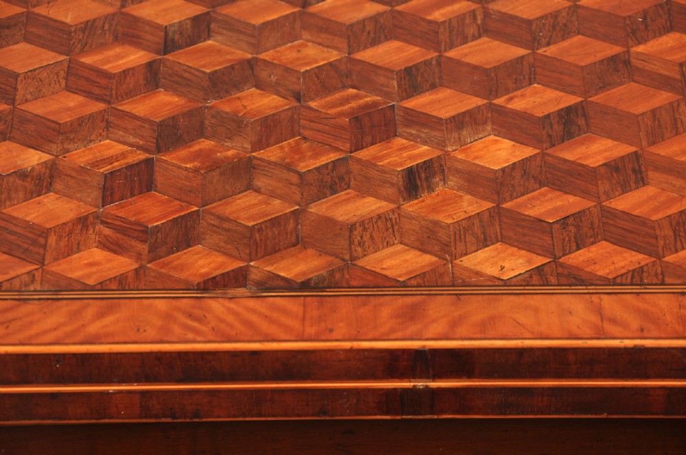 An 18th-century demilune card table featuring a geometric parquetry top, inlaid apron, and four square tapered legs ending in spade feet. View VIII