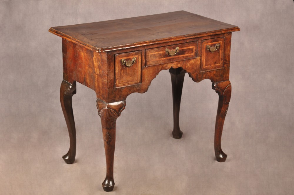 A Rare Early 18th Century Walnut Lowboy