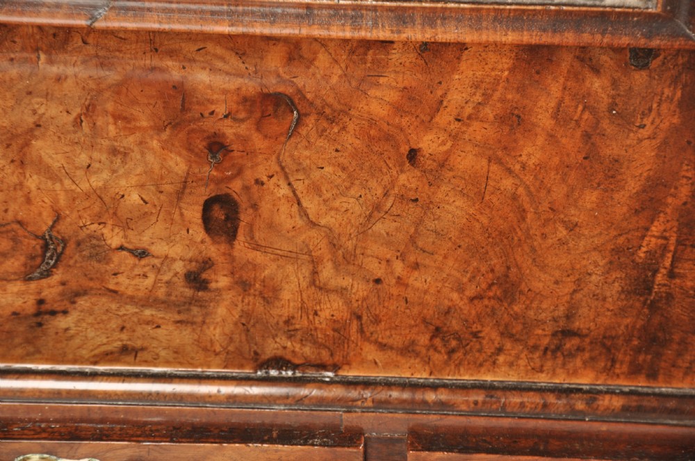 An 18th-century walnut toilet mirror featuring a rectangular adjustable glass frame resting above a three-drawer box base with brass handles. View VIII