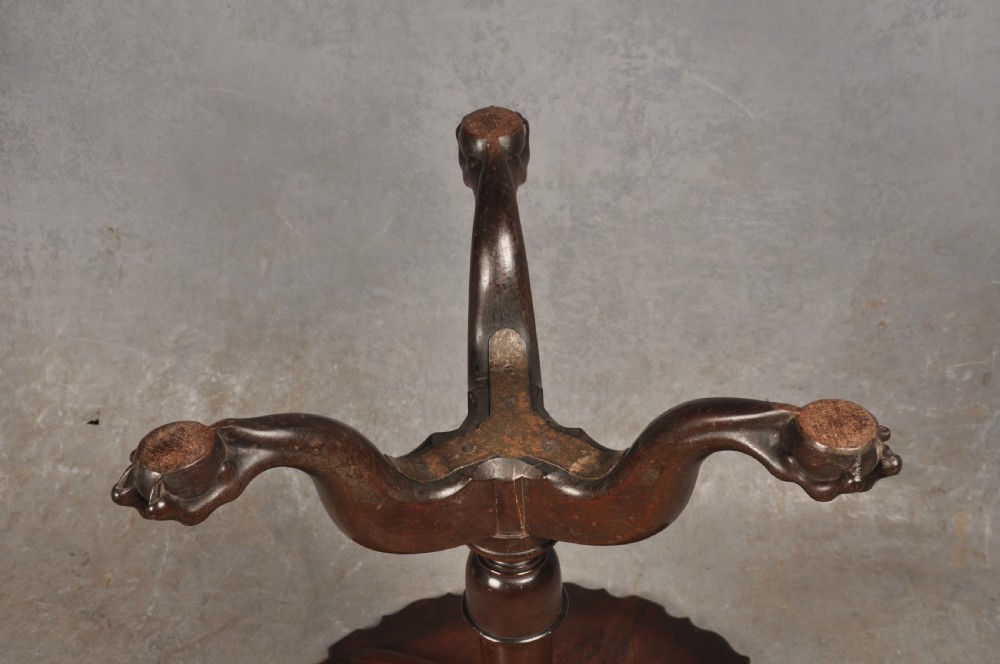 An 18th-century mahogany tripod table featuring a circular scalloped piecrust top, a turned column, and three cabriole legs ending in carved feet. View IX
