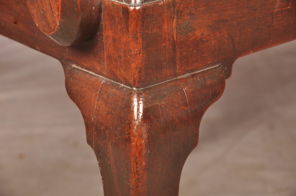 An 18th-century mahogany armchair with a carved pierced splat back, shaped arms, a tapestry-upholstered seat, and cabriole front legs ending in ball and claw feet. View XII