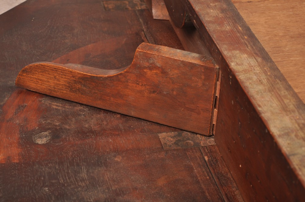 A late 18th-century mahogany Pembroke table with drop-leaf sides, square tapered legs on castors, and a single drawer with octagonal brass handles. View XIII