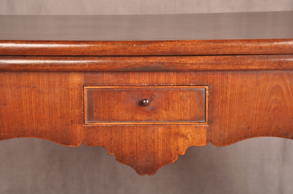 An 18th-century George II mahogany card table with a fold-over shaped top, a frieze drawer, and carved cabriole legs with claw-and-ball feet. View VIII