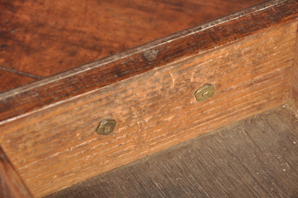 An 18th-century George II walnut lowboy side table featuring three drawers with brass handles, a shaped kneehole apron, and cabriole legs on pad feet. View VII