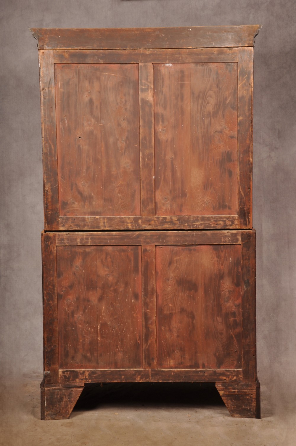 An 18th-century mahogany tallboy featuring stacked upper and lower drawer sections, brass swan-neck handles, fluted sides, and bracket feet. View XIV