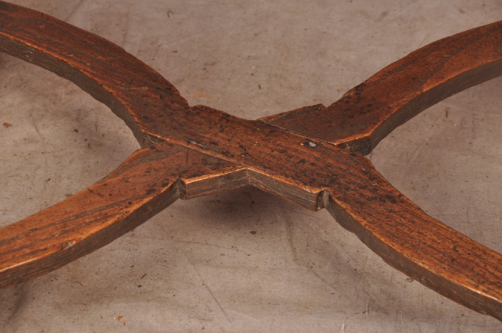 A 17th-century oak side table featuring baluster-turned legs, a shaped X-stretcher, a single frieze drawer with a brass drop handle, and a rectangular timber top. View VIII