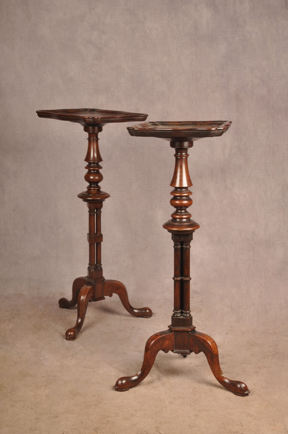 A pair of dark rosewood pedestal stands featuring turned baluster shafts, shaped tops, and tripod bases with pad feet. View III