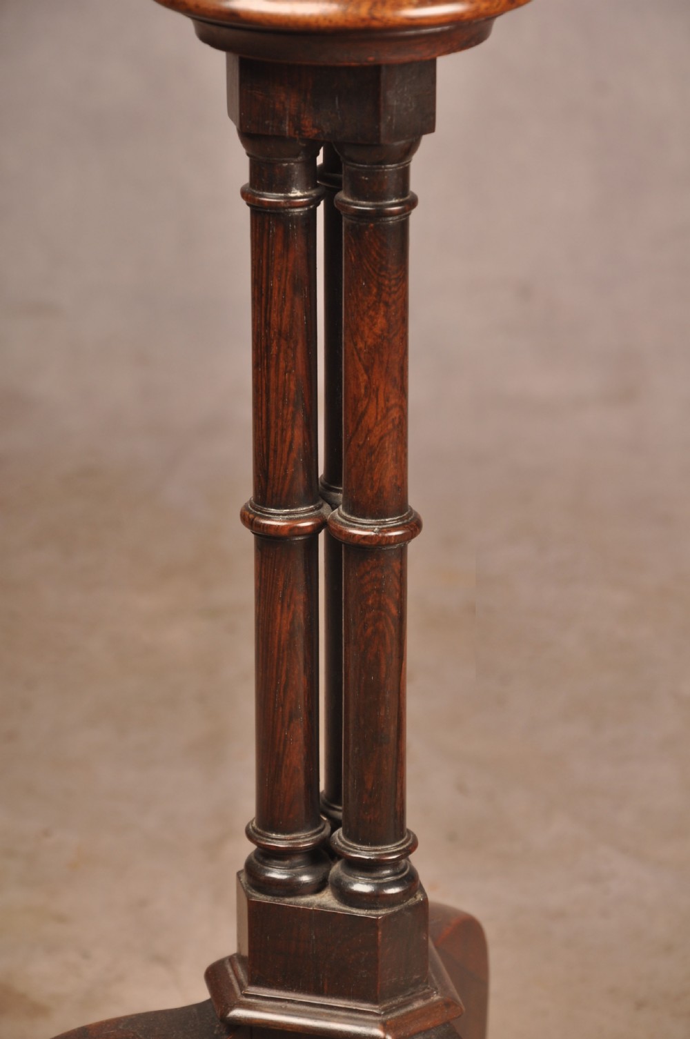 A pair of dark rosewood pedestal stands featuring turned baluster shafts, shaped tops, and tripod bases with pad feet. View IV