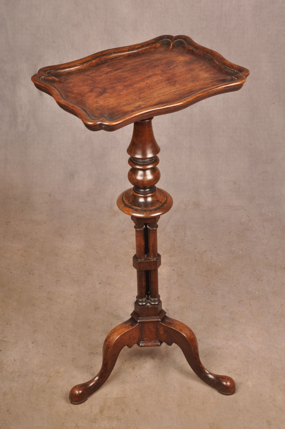 A pair of dark rosewood pedestal stands featuring turned baluster shafts, shaped tops, and tripod bases with pad feet. View XI