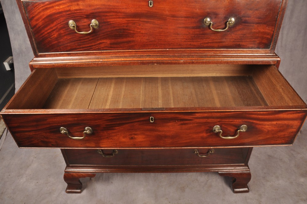 An 18th-century Georgian mahogany chest-on-chest featuring a two-part construction with brass swan-neck handles and bracket feet. View VIII