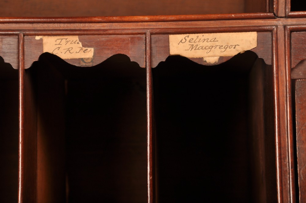 An 18th-century mahogany bureau cabinet featuring an architectural pediment top, two panelled upper doors, a slant-front writing desk, and lower drawers on bracket feet. View XII