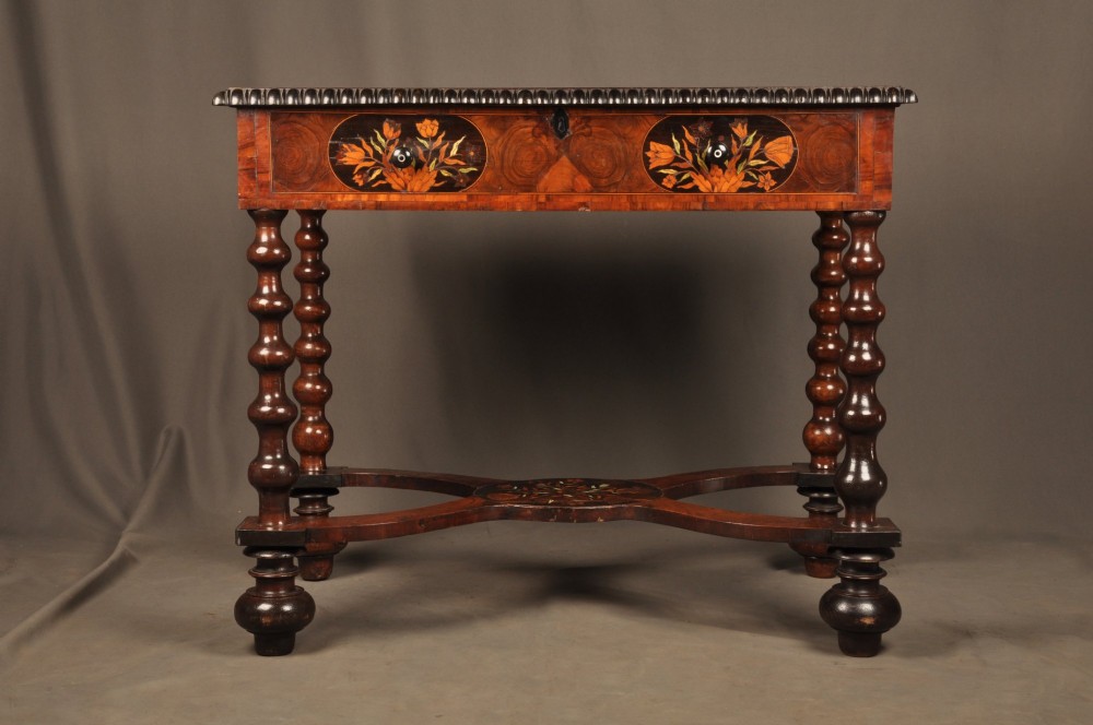 An antique brown walnut centre table featuring detailed floral marquetry inlays across the tabletop, single drawer front, and stretcher base, supported by bobbin-turned legs. View XIV