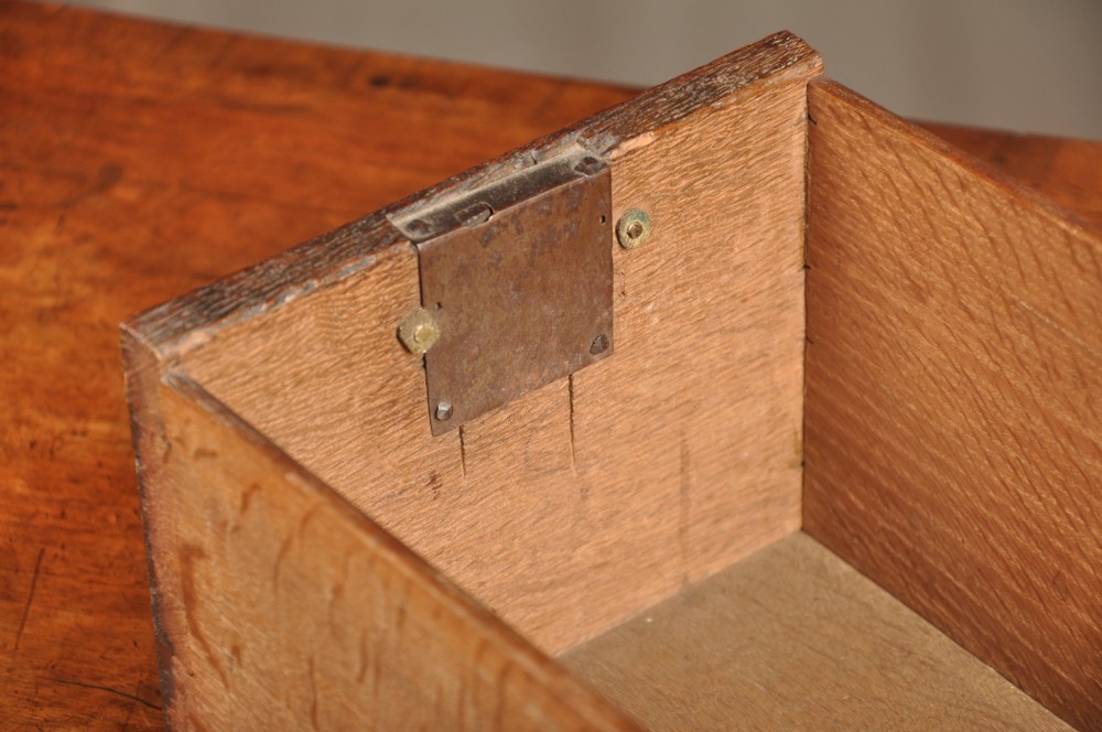 A Queen Anne walnut kneehole desk featuring figured wood veneers, seven drawers with brass handles, a central recessed cupboard, and bracket feet. View XIII