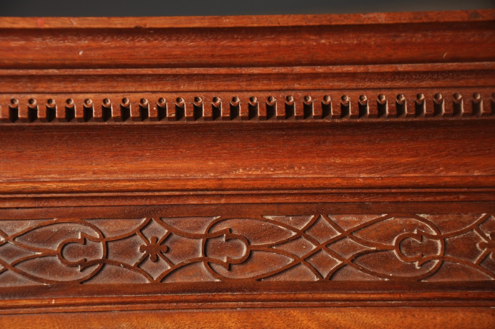 An 18th-century Georgian mahogany tallboy chest-on-chest with flame mahogany drawer fronts, brass swan-neck handles, fluted quarter columns, and bracket feet. View VIII
