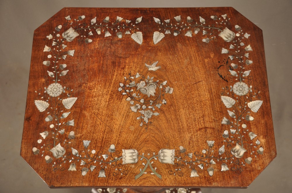 An antique octagonal mahogany work table with mother-of-pearl floral inlay, a central carved pedestal, and a quadruped base. View VIII
