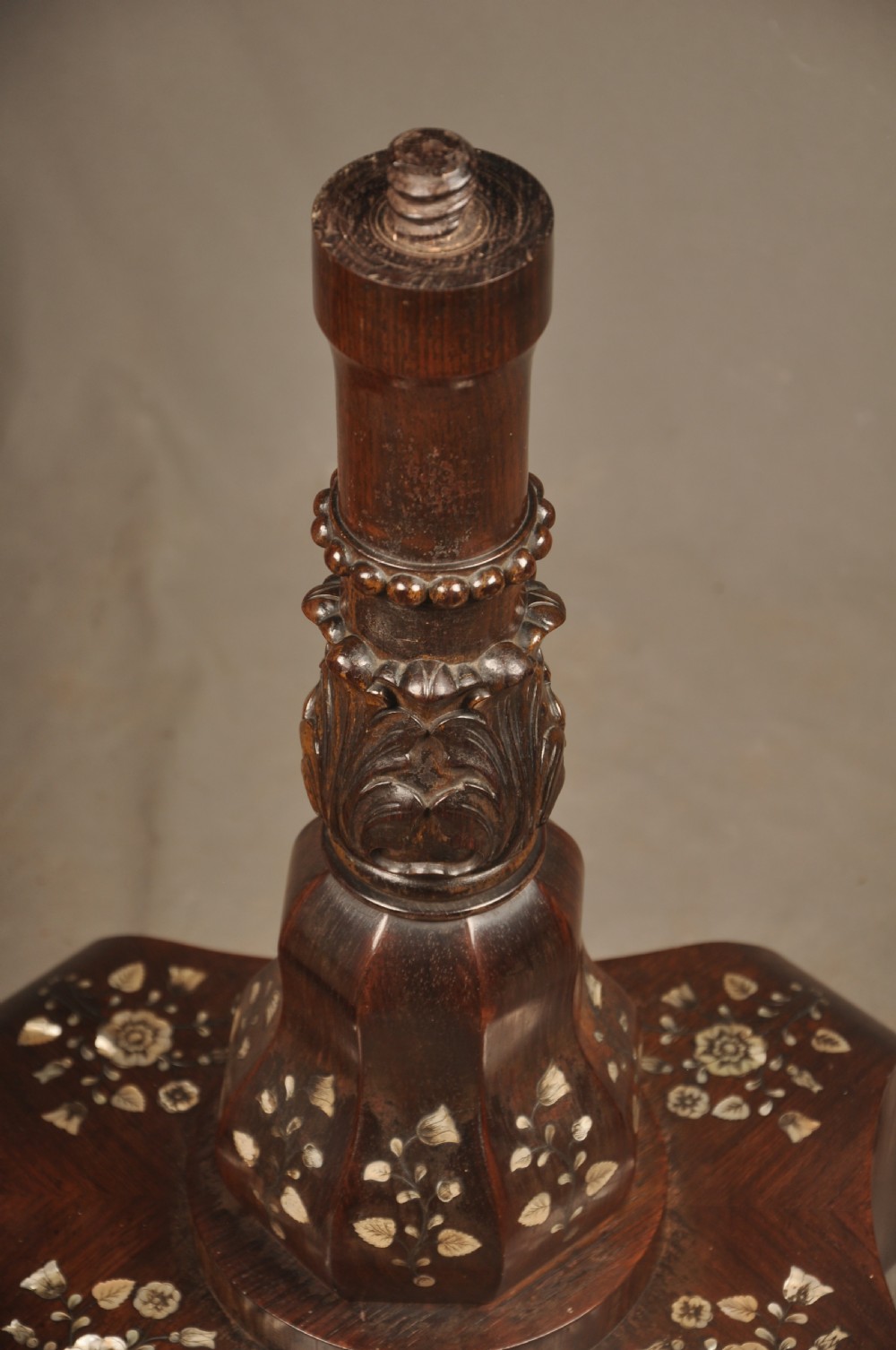An antique octagonal mahogany work table with mother-of-pearl floral inlay, a central carved pedestal, and a quadruped base. View XIV
