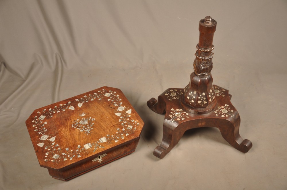 An antique octagonal mahogany work table with mother-of-pearl floral inlay, a central carved pedestal, and a quadruped base. View XVI