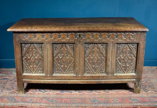panelled oak coffer with medieval style carved decoration with key c1700 - CATEGORY: ANTIQUE CHESTS - DATED 1700