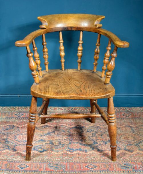 A VICTORIAN ELM AND BEECH SMOKERS BOW ARMCHAIR C1860 - ADDITIONAL PHOTO 1