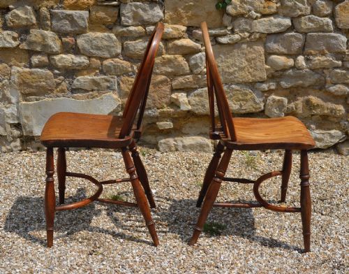 A PAIR OF COUNTRY YEW AND ELM WHEEL BACK CHAIRS WITH CRINOLINE STRETCHERS C 1800 - ADDITIONAL PHOTO 11