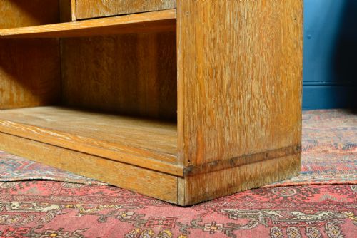 A LIMED OAK ASYMMETRICAL OPEN BOOKCASE ATTRIBUTED TO HEAL'S C1930 - ADDITIONAL PHOTO 3