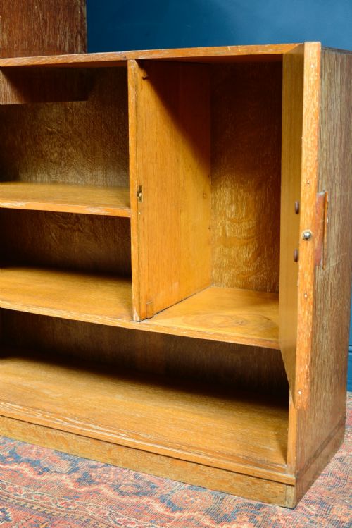 A LIMED OAK ASYMMETRICAL OPEN BOOKCASE ATTRIBUTED TO HEAL'S C1930 - ADDITIONAL PHOTO 6