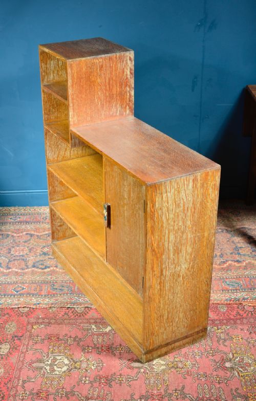 A LIMED OAK ASYMMETRICAL OPEN BOOKCASE ATTRIBUTED TO HEAL'S C1930 - ADDITIONAL PHOTO 7
