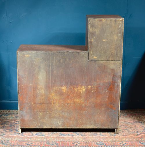 A LIMED OAK ASYMMETRICAL OPEN BOOKCASE ATTRIBUTED TO HEAL'S C1930 - ADDITIONAL PHOTO 8