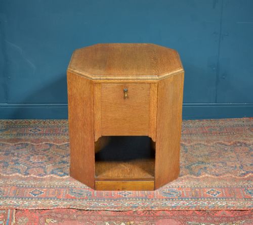 a golden oak octagonal book table attributed to heals c1930 - CATEGORY: ANTIQUE CUPBOARDS - DATED 1930