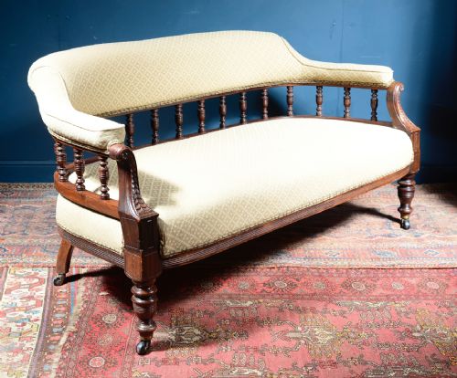 a victorian aesthetic movement mahogany spindle back sofa c1880 - CATEGORY: ANTIQUE SOFAS - DATED 1880