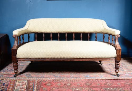 A VICTORIAN AESTHETIC MOVEMENT MAHOGANY SPINDLE BACK SOFA C1880 - ADDITIONAL PHOTO 1