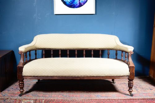 A VICTORIAN AESTHETIC MOVEMENT MAHOGANY SPINDLE BACK SOFA C1880 - ADDITIONAL PHOTO 3