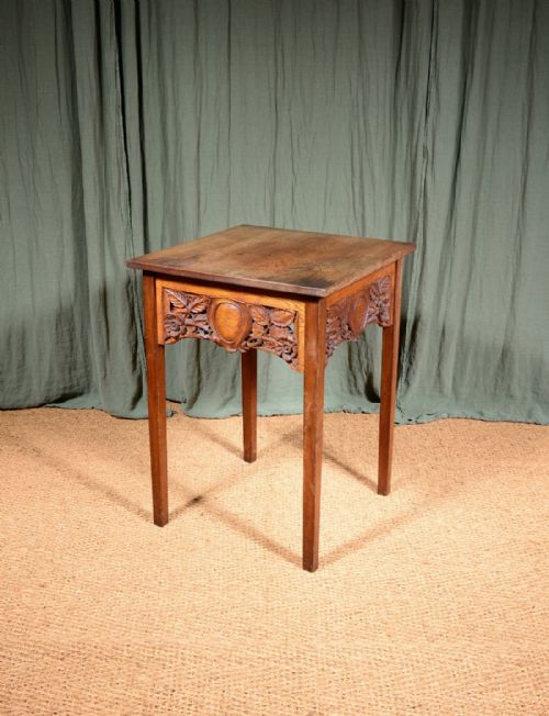 A VICTORIAN OAK TABLE WITH CARVED DECORATION C1860 - ADDITIONAL PHOTO 2